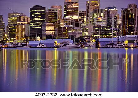 Skyscrapers in a city lit up at dusk, Coal Harbor, Vancouver, British Columbia, Canada View Large Photo Image Stock Image - Skyscrapers in a city lit up at dusk, Coal Harbor, Vancouver, British Columbia, Canada. Fotosearch