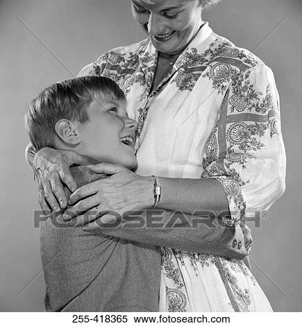 Son hugging mother View Large Photo Image Stock Photography - Son hugging mother. Fotosearch
