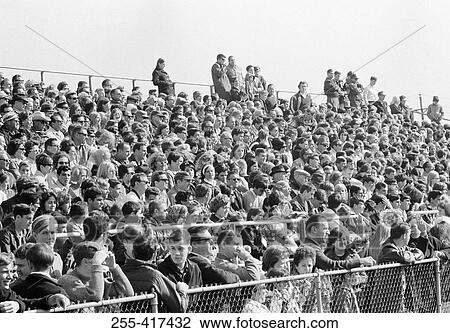 Stock Image - Spectators on stadium. Fotosearch