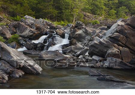 Picture - Stream flowing through rocks, Cossatot Falls, Arkansas, USA. Fotosearch