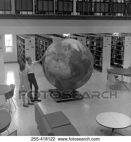 Stock Image - Students in library. Fotosearch