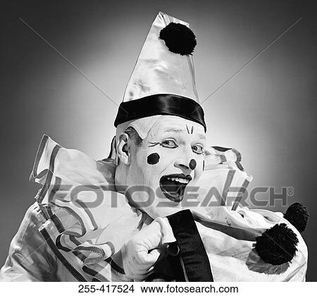 Picture - Studio portrait of clown laughing. Fotosearch
