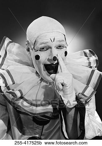 Stock Image - Studio portrait of clown. Fotosearch
