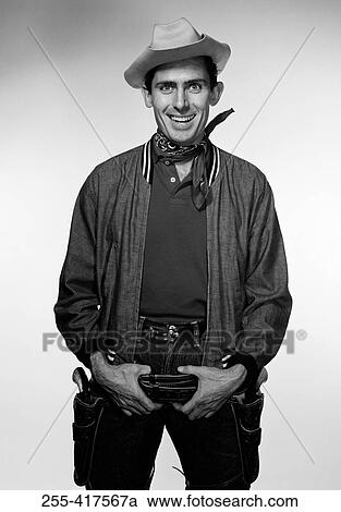 Studio portrait of cowboy View Large Photo Image Stock Image - Studio portrait of cowboy. Fotosearch