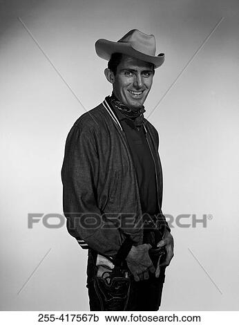 Studio portrait of cowboy View Large Photo Image Stock Image - Studio portrait of cowboy. Fotosearch