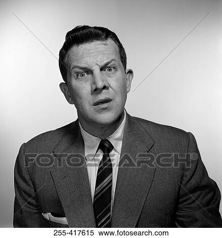 Stock Photography - Studio portrait of frustrated businessman. Fotosearch