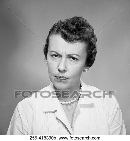 Studio portrait of grumpy woman View Large Photo Image Stock Image - Studio portrait of grumpy woman. Fotosearch