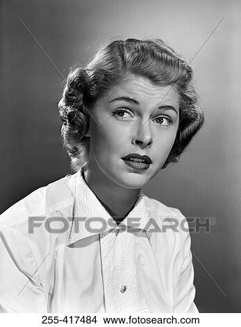 Studio portrait of mid adult woman View Large Photo Image Picture - Studio portrait of mid adult woman. Fotosearch