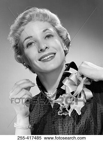 Studio portrait of mid adult woman View Large Photo Image Stock Photography - Studio portrait of mid adult woman. Fotosearch