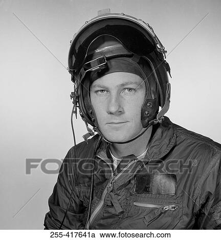 Studio portrait of pilot wearing helmet View Large Photo Image Stock Image - Studio portrait of pilot wearing helmet. Fotosearch