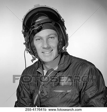 Studio portrait of pilot wearing helmet View Large Photo Image Stock Image - Studio portrait of pilot wearing helmet. Fotosearch