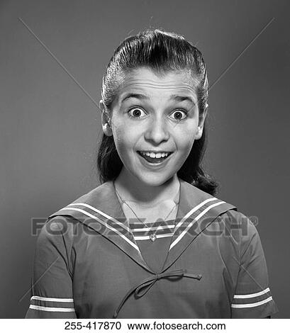 Studio portrait of surprised school girl View Large Photo Image Stock Image - Studio portrait of surprised school girl. Fotosearch