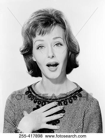 Studio portrait of surprised woman View Large Photo Image Stock Photo - Studio portrait of surprised woman. Fotosearch