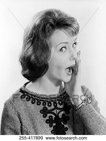 Stock Photo - Studio portrait of surprised woman. Fotosearch