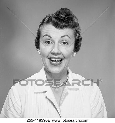 Studio portrait of woman smiling View Large Photo Image Stock Image - Studio portrait of woman smiling. Fotosearch