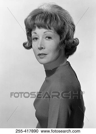 Studio portrait of young woman View Large Photo Image Stock Image - Studio portrait of young woman. Fotosearch