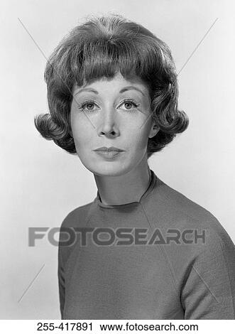 Studio portrait of young woman View Large Photo Image Stock Image - Studio portrait of young woman. Fotosearch
