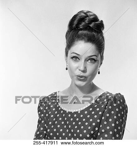 Studio portrait of young woman View Large Photo Image Stock Image - Studio portrait of young woman. Fotosearch