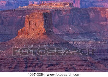 Sunlight falling on a butte in a canyon, Buck Canyon Overlook, Canyonlands National Park, Utah, USA View Large Photo Image Picture - Sunlight falling on a butte in a canyon, Buck Canyon Overlook, Canyonlands National Park, Utah, USA. Fotosearch