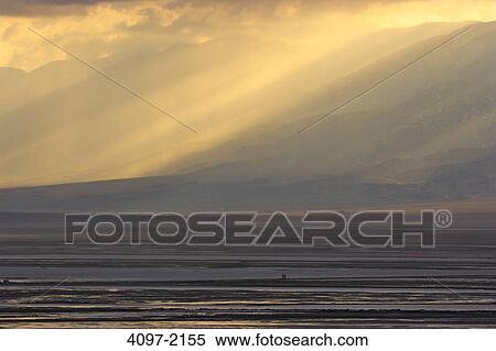 Sunset over a lake, Owens Lake, Californian Sierra Nevada, California, USA View Large Photo Image Stock Photography - Sunset over a lake, Owens Lake, Californian Sierra Nevada, California, USA. Fotosearch