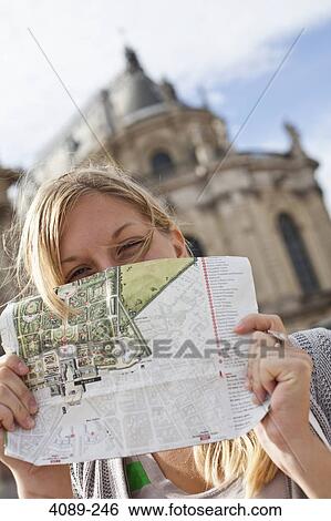 Teenage girl reading a map with a palace in the background, Chateau De Versailles, Versailles, Paris, Ile-De-France, France View Large Photo Image Stock Photograph - Teenage girl reading a map with a palace in the background, Chateau De Versailles, Versailles, Paris, Ile-De-France, France. Fotosearch