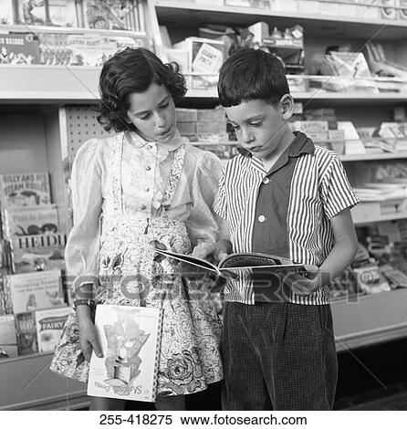 Stock Photography - Two kids in kiosk. Fotosearch