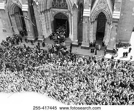 USA, New York City, high angle view of crowds outside cathedral View Large Photo Image Stock Photography - USA, New York City, high angle view of crowds outside cathedral. Fotosearch