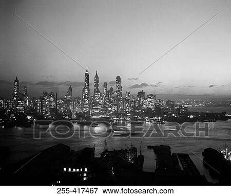 Stock Photo - USA, New York City, skyline at night. Fotosearch