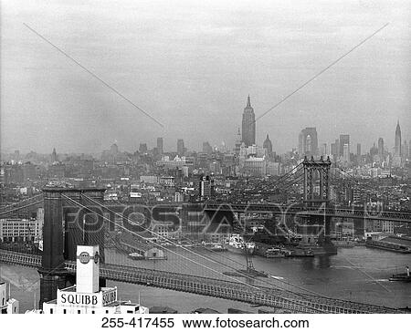 USA, New York City, skyline with bridges on East River View Large Photo Image Stock Photography - USA, New York City, skyline with bridges on East River. Fotosearch