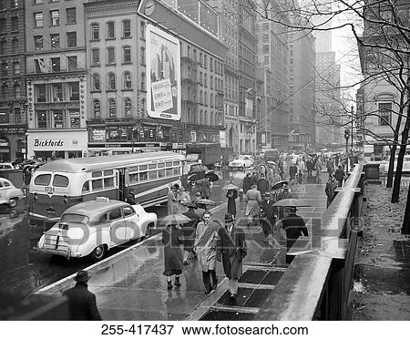 USA, New York City, street scene on rainy day View Large Photo Image Stock Photo - USA, New York City, street scene on rainy day. Fotosearch