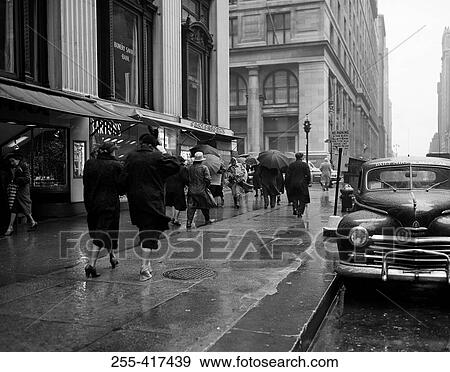 USA, New York City, street scene on rainy day View Large Photo Image Stock Photo - USA, New York City, street scene on rainy day. Fotosearch