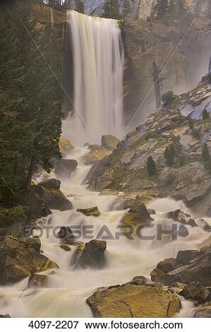 Stock Photo - Waterfall in a forest, Vernal Falls, Yosemite National Park, California, USA. Fotosearch