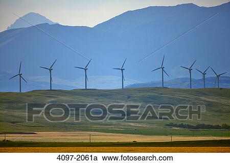 Stock Image - Wind turbines on a hill, Alberta, Canada. Fotosearch