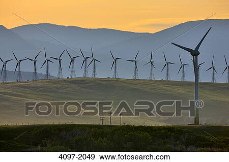 Wind turbines on a hill, Alberta, Canada View Large Photo Image Stock Photo - Wind turbines on a hill, Alberta, Canada. Fotosearch