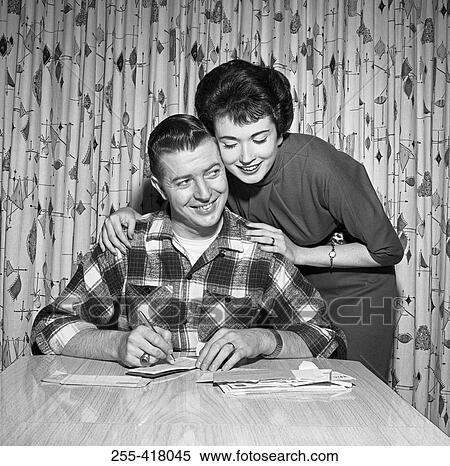 Young couple counting bills View Large Photo Image Stock Photography - Young couple counting bills. Fotosearch