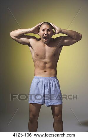 Young man shouting View Large Photo Image Stock Photograph - Young man shouting. Fotosearch