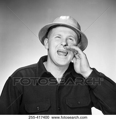 Young man shouting, studio shot View Large Photo Image Stock Image - Young man shouting, studio shot. Fotosearch