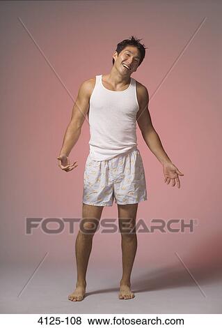 Stock Photo - Young man smiling. Fotosearch