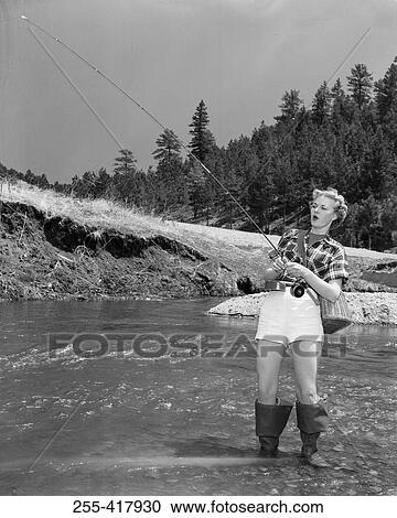 Young woman bow fishing View Large Photo Image Stock Image - Young woman bow fishing. Fotosearch