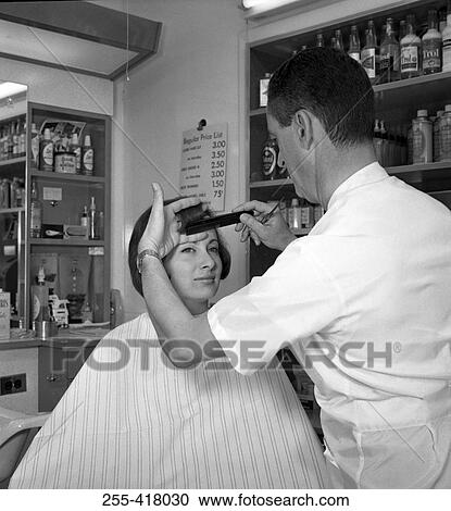 Young woman having hair done at hair salon View Large Photo Image Stock Image - Young woman having hair done at hair salon. Fotosearch