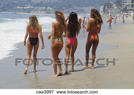 four-girls-in-bikinis-walking-along-pict