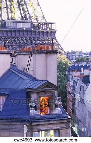 Woman In Top Floor Paris Apartment Relaxing Black Near Eiffel Tower Stock Image