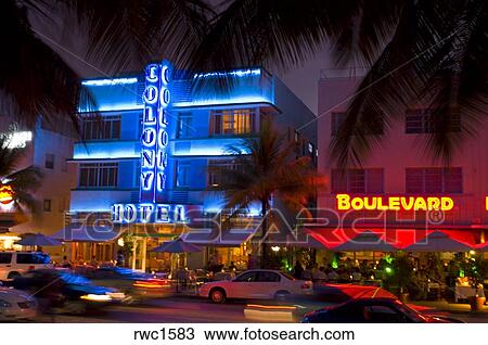 Stock Photo Of Miami Beach Florida Usa The Colony Hotel At Miami Beach Florida Usa The Colony Hotel At Night With Glowing Neon Signs On Ocean Drive In South Neighborhood Known For Its Art Deco