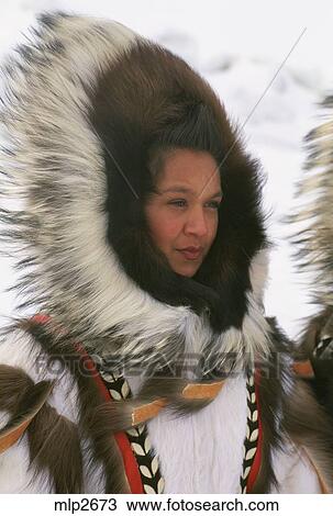 Stock Photo of Young Eskimo woman dressed in traditional fur clothing ...