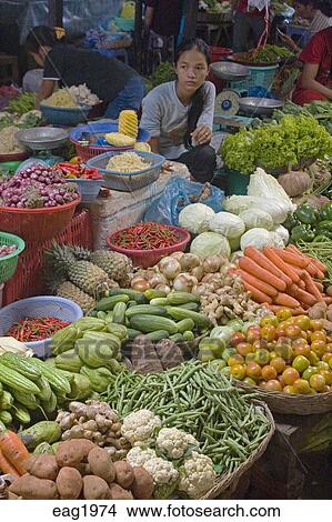 cambodian pineapple sells young cucumbers onions chiles cauliflower peppers chilies beans ginger vegetables bell reap cambodia wat angkor siem covered