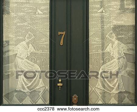 Canada Quebec Quebec City Lace Curtains On A Doorway Window