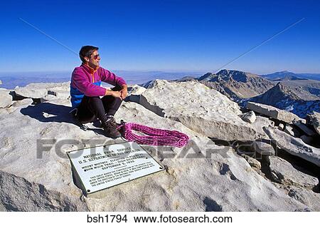 Climber On The Summit Of Mount Whitney With Plaque In Foreground Highest Point In The Continental Us Inyo National Forest Sequoia National Park California Picture Bsh1794 Fotosearch