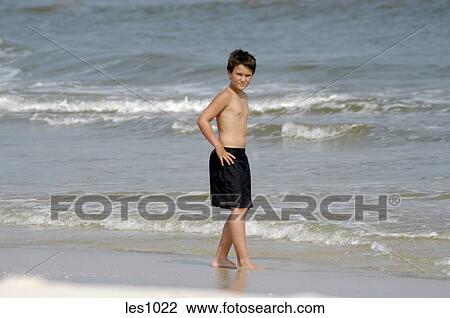 Pre Adolescent Boy Models In Gq Fashion On The Beach Stock Image Les1022 Fotosearch