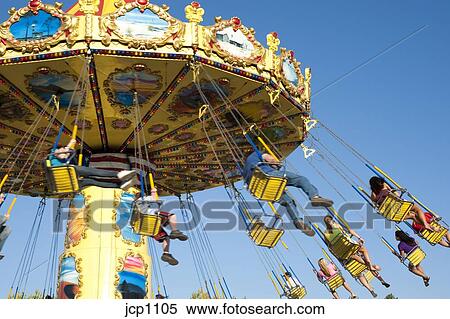 Swing Ride With Kids Enjoying The Ride At The Evergreen State Fair Monroe Washingotn State Usa Stock Photography