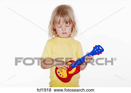 white toy guitar